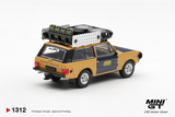 Mô hình xe Range Rover 1981 Camel Trophy Sumatra H.Fischer & W.Bays bản card tỉ lệ 1:64 MiniGT MGT01312 