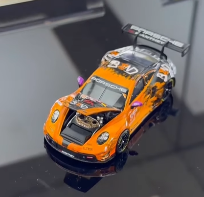  Mô hình xe Porsche 911 GT3 R - EMA Motorsport-2024 LeMans 24H LMGT3 Winner #91 tỉ lệ 1:64 Trends Hobby 241084K 