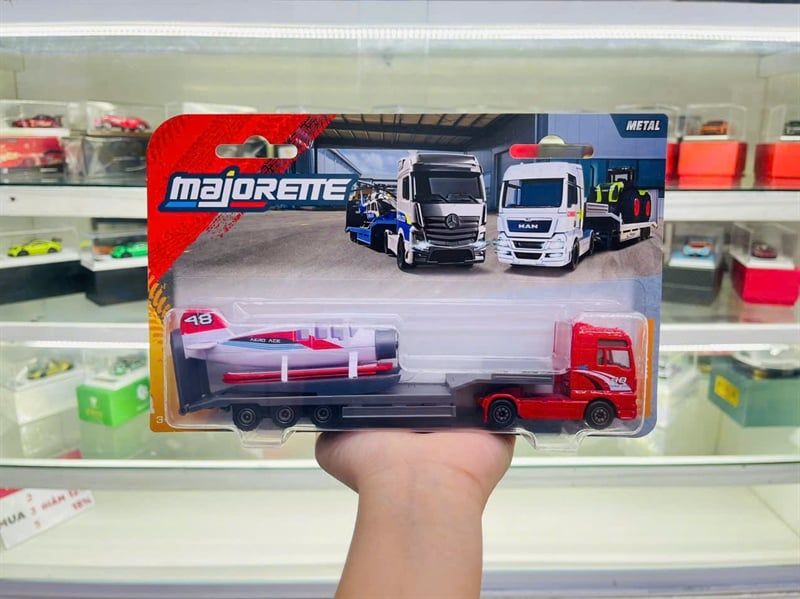  Mô hình xe city transporter Man TGX XXL with Floatplane 18.8cm tỉ lệ 1:64 Majorette 8503003000 