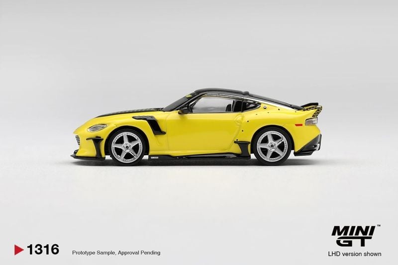  Mô hình xe Nissan Z VeilSide FFZ400 Ikazuchi Yellow bản card tỉ lệ 1:64 MiniGT MGT01316 
