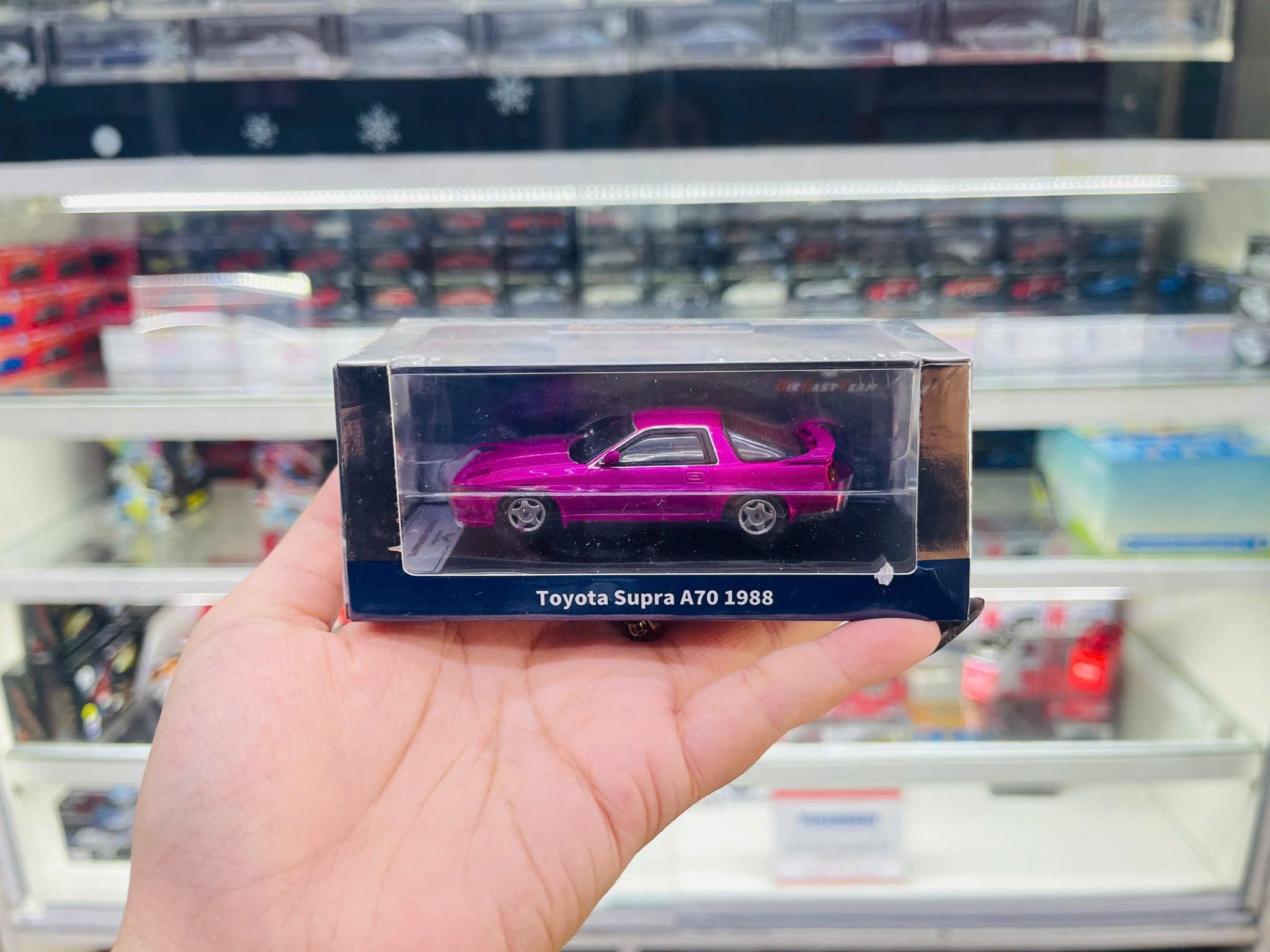  Toyota Supra A70 1988 pink tỉ lệ 1:64 DCT model LL-033-251 