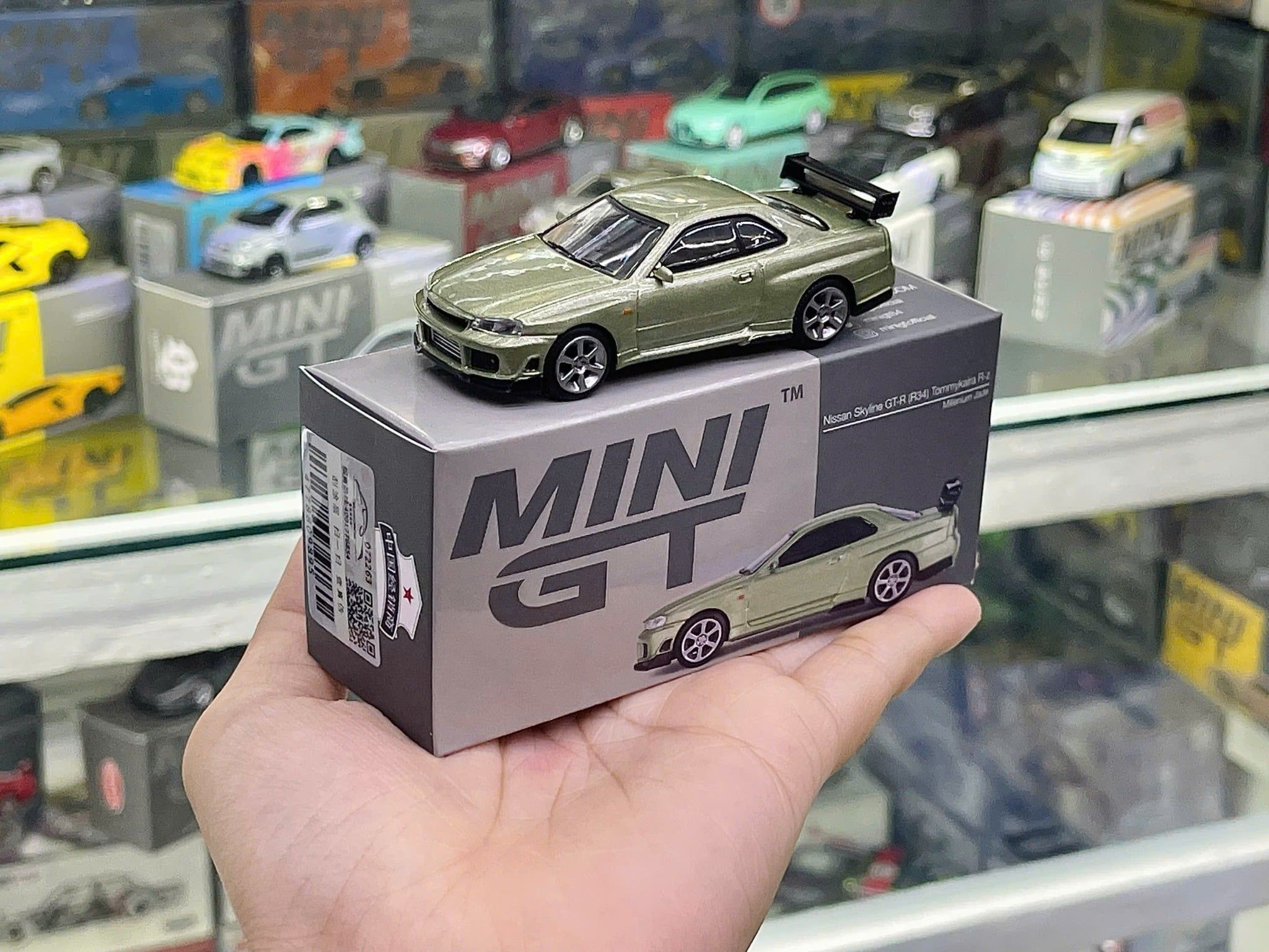  [Hàng loose] Mô hình xe ô tô Nissan Skyline GT-R (R34) Tommykaira R-z Millenium Jade tỉ lệ 1:64 MiniGT MGT00697 