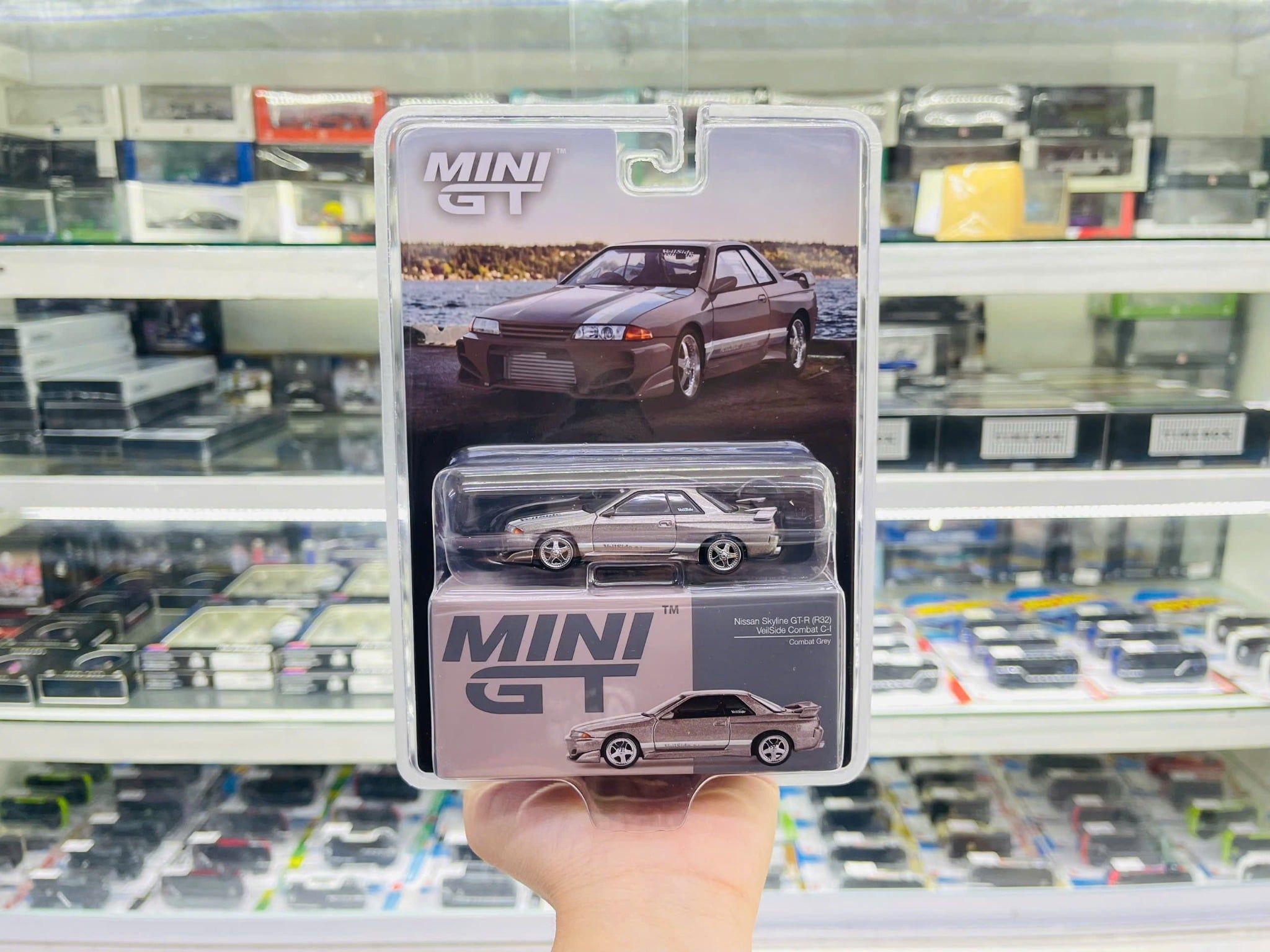  Mô hình xe Nissan Skyline GT-R (R32) Veilside Combat C-I Veilside Combat Grey bản card tỉ lệ 1:64 MiniGT MGT00971 