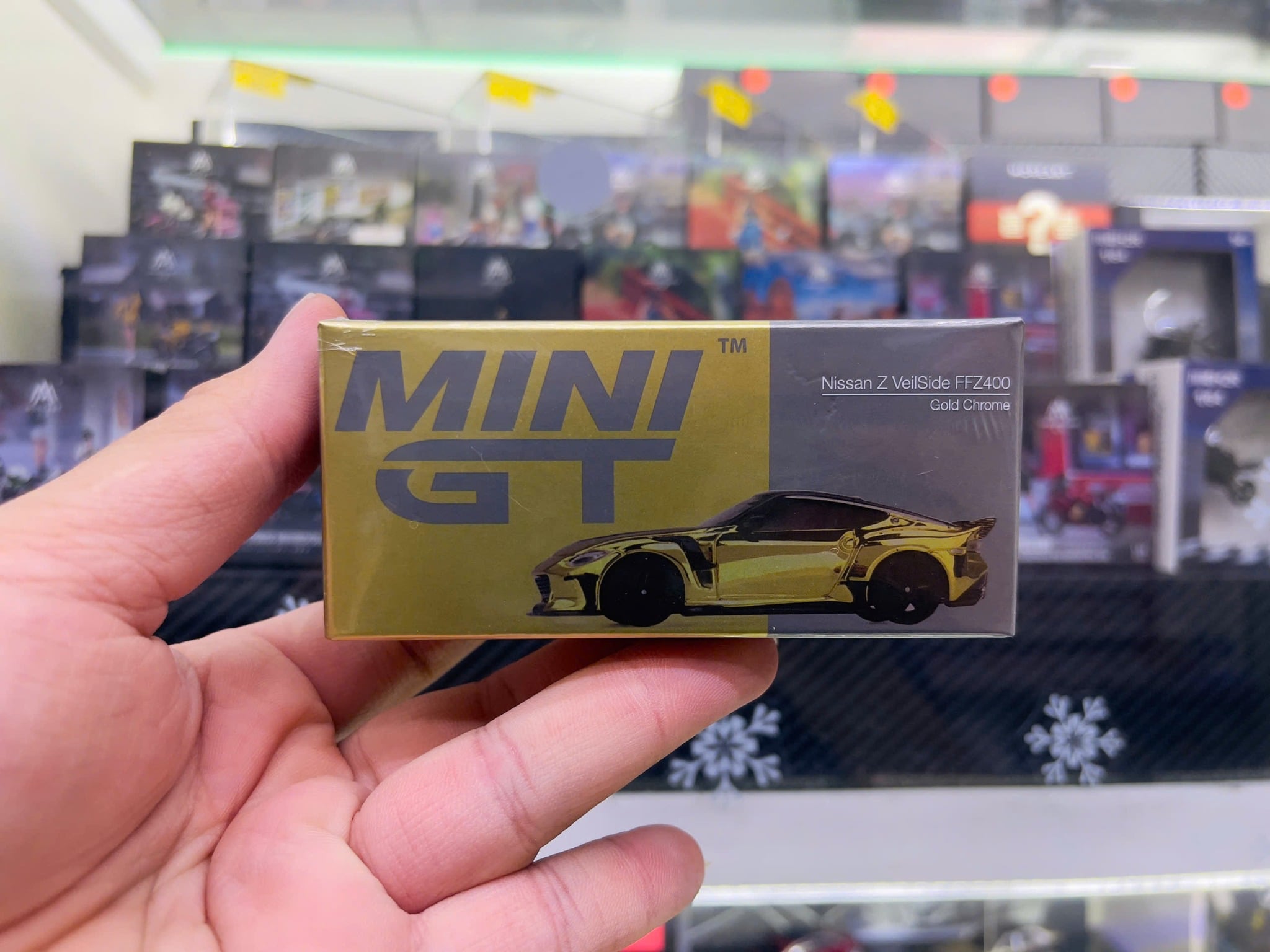  Mô hình xe Nissan Z VeilSide FFZ400 Gold Chrome tỉ lệ 1:64 MiniGT MGT00985-CH 