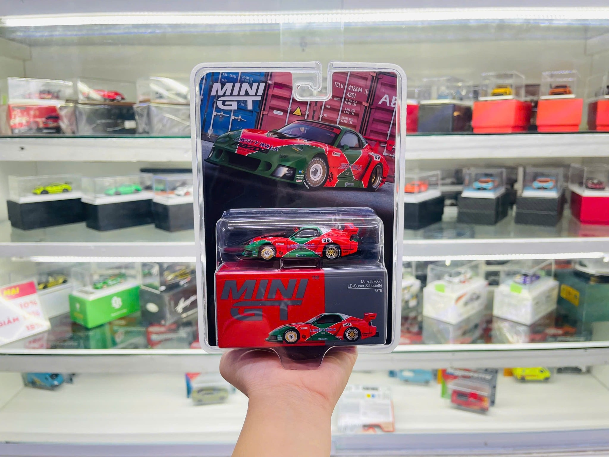  Mô hình xe Mazda RX-7 LB-Super Silhouette 787B card tỉ lệ 1:64 MiniGT MGT00990 