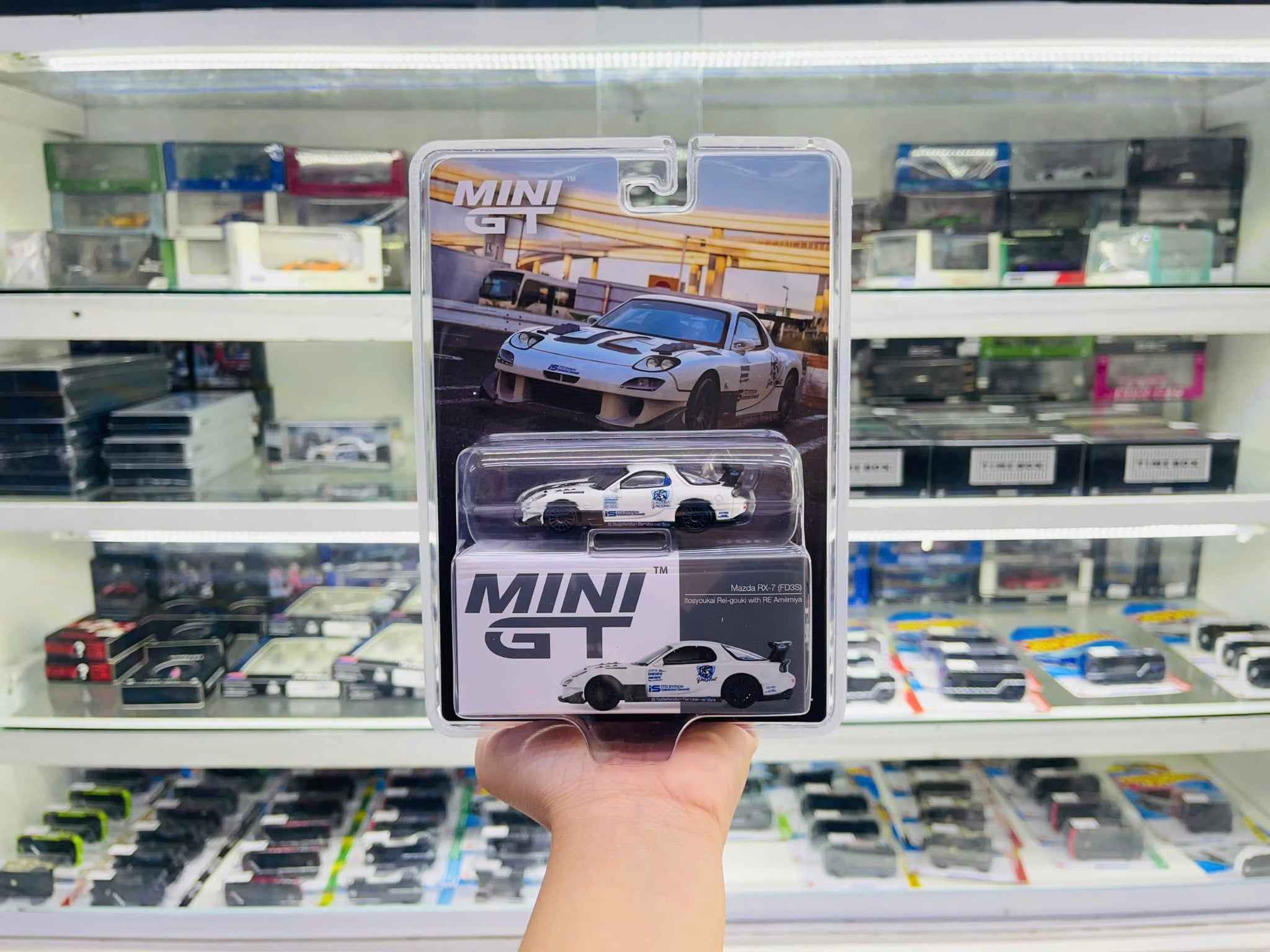  Mô hình xe Mazda RX-7 (FD3S) Itosyoukai Rei-gouki with RE Amemiya tỉ lệ 1:64 MiniGT MGT00996-BL 