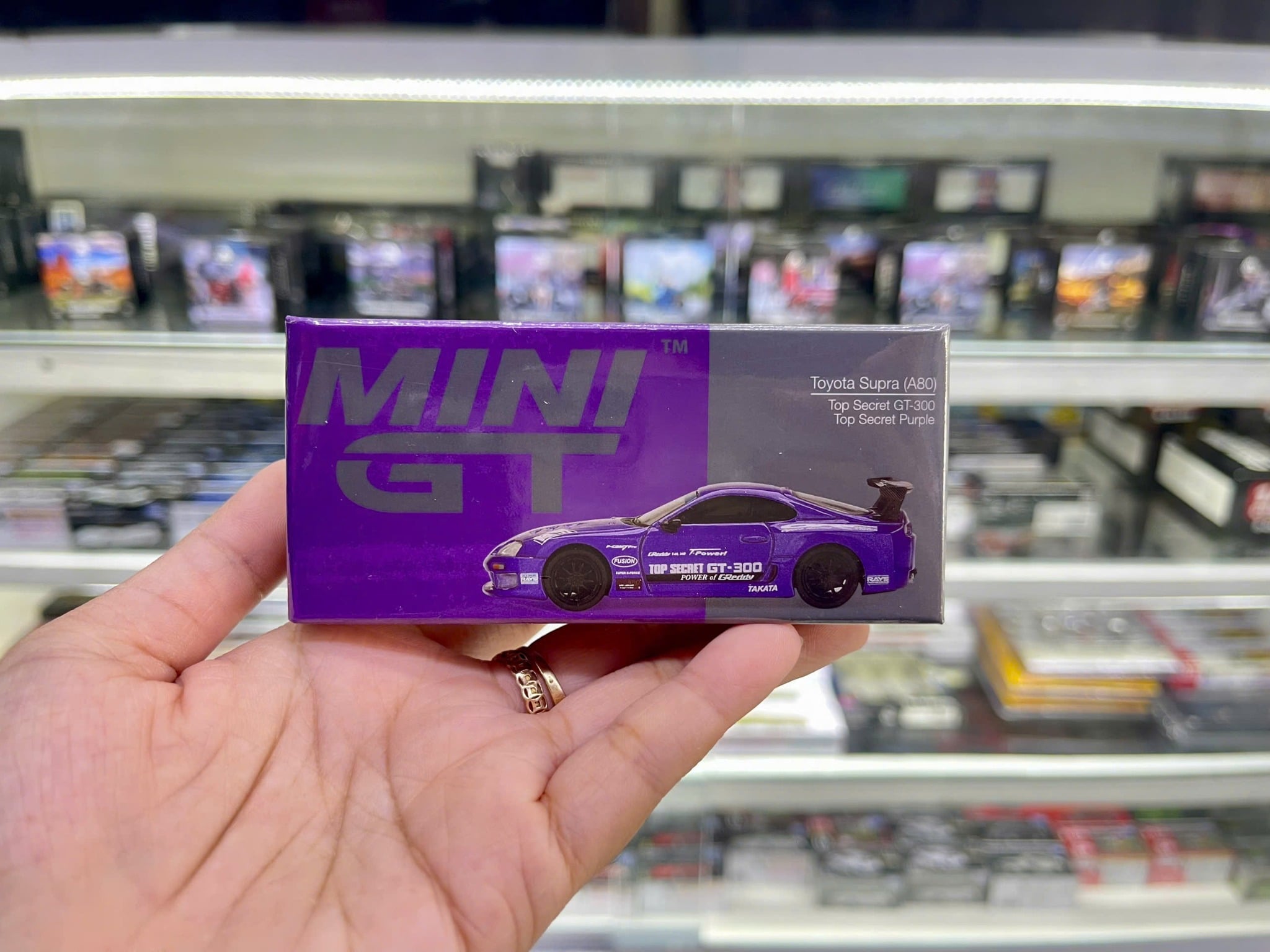  Mô hình xe Toyota Supra (A80) Top Secret GT-300 Top Secret Purple tỉ lệ 1:64 MiniGT MGT01067 
