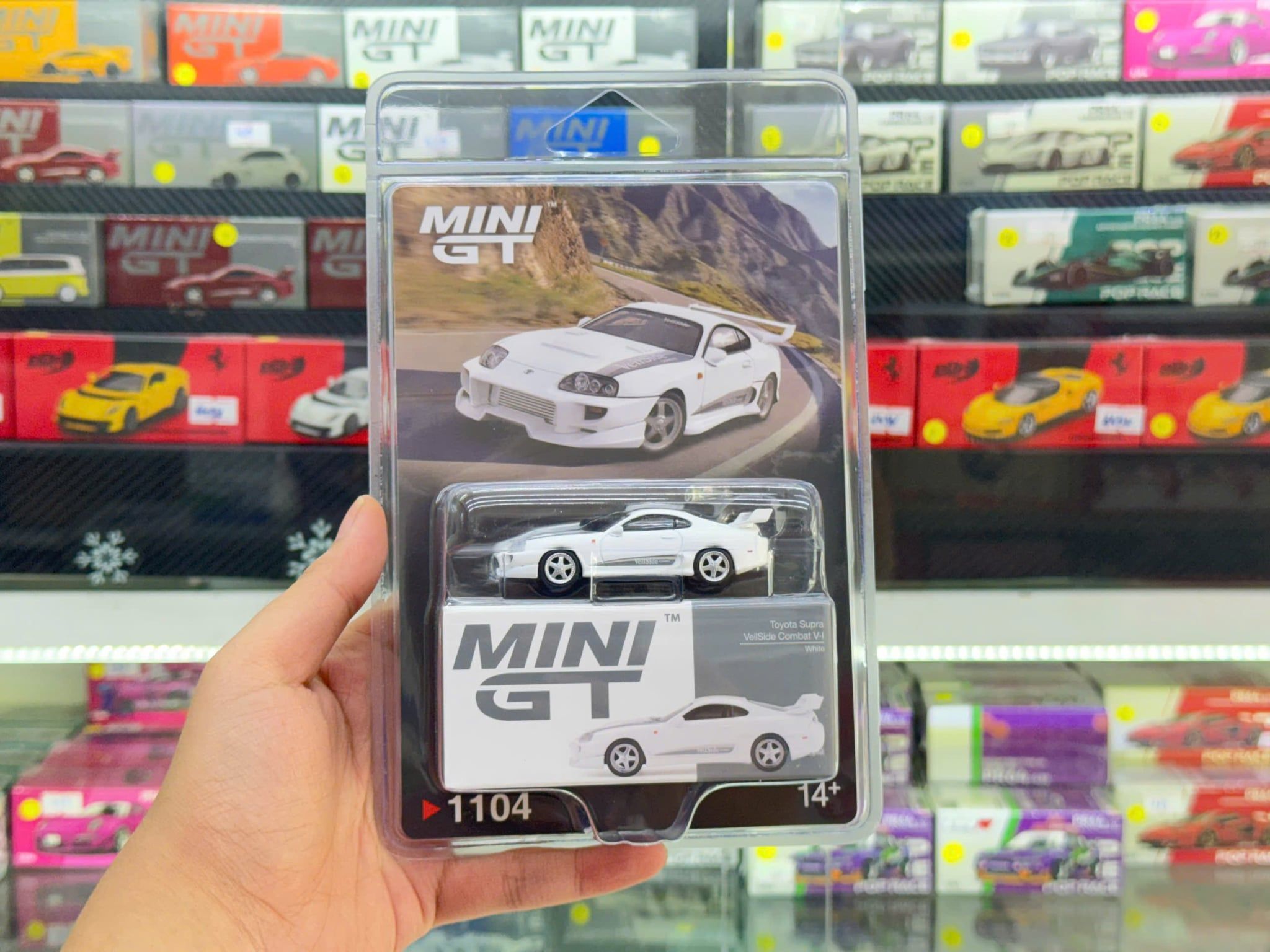  Mô hình xe Toyota Supra VeilSide Combat V-I White bản card tỉ lệ 1:64 MiniGT MGT01104 