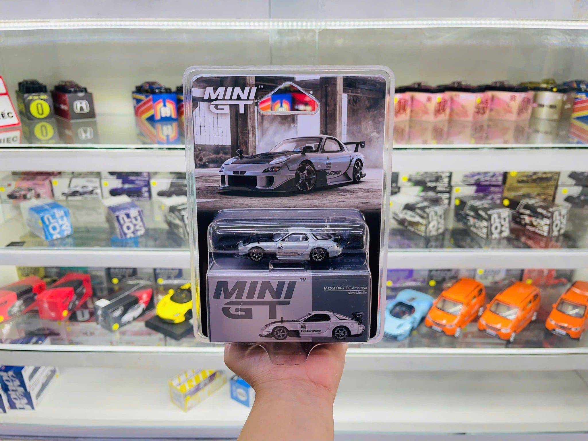  Mô hình xe Mazda RX-7 RE-Amemiya Silver Metallic bản card tỉ lệ 1:64 MiniGT MGT01106 HAVE CHASE 