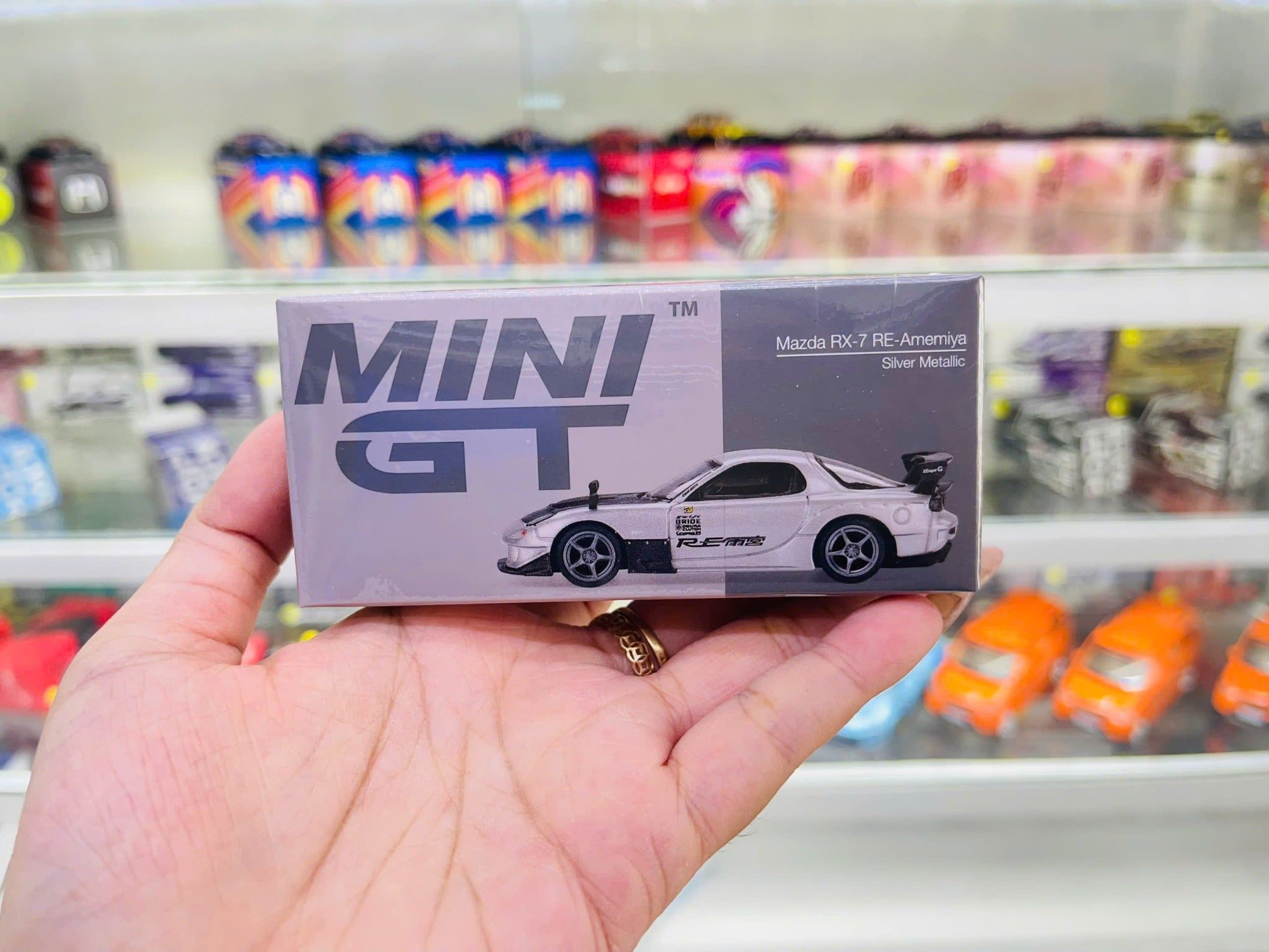  Mô hình xe Mazda RX-7 RE-Amemiya Silver Metallic tỉ lệ 1:64 MiniGT MGT01106 