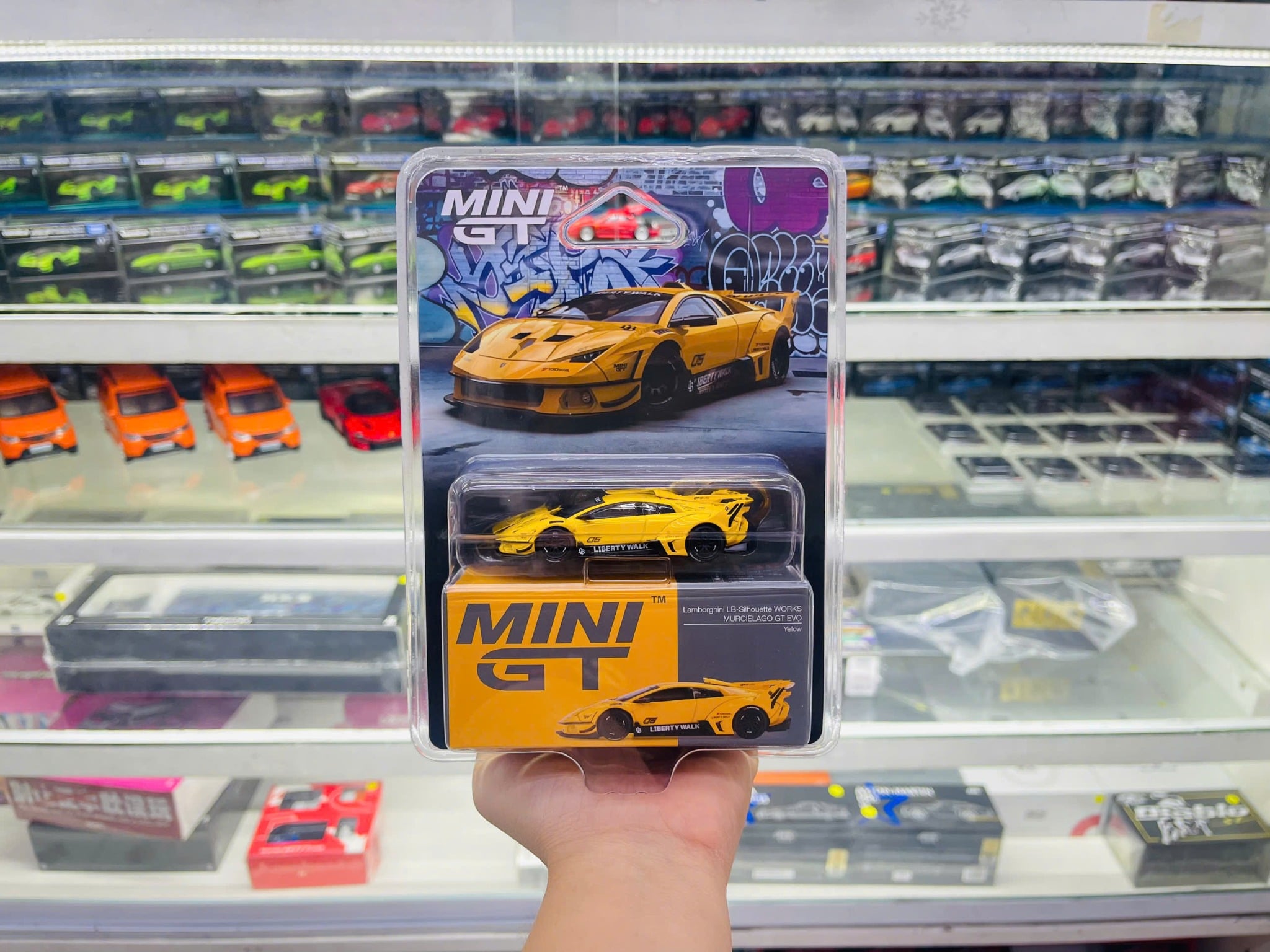  Mô hình xe Lamborghini LB-Silhouette WORKS MURCIELAGO GT Evo Yellow bản card tỉ lệ 1:64 MiniGT MGT01135 NO CHASE CAR 