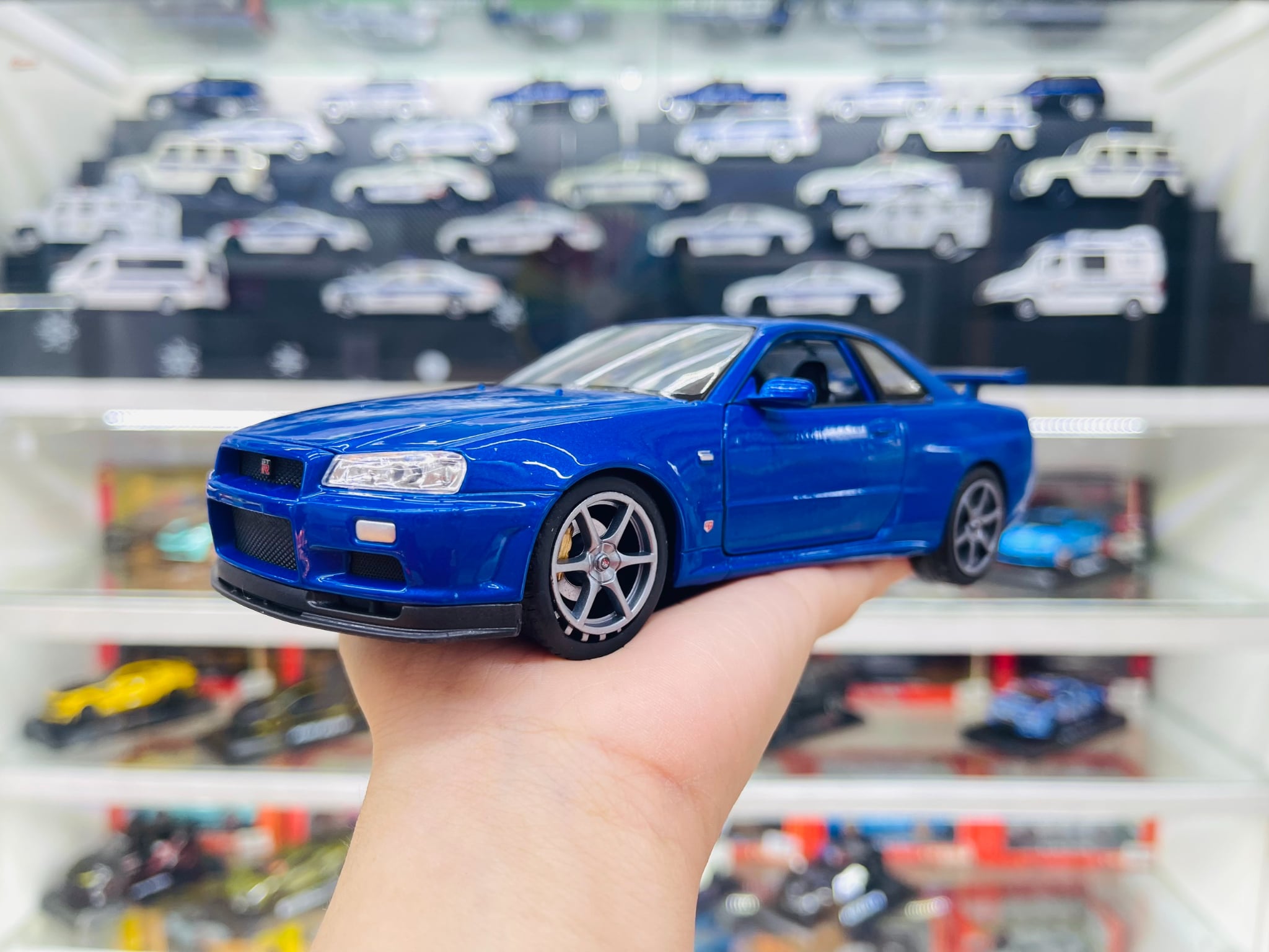  Mô hình xe Nissan Skyline Gt-R R34 có bản quyền 1:24 Welly OT132 