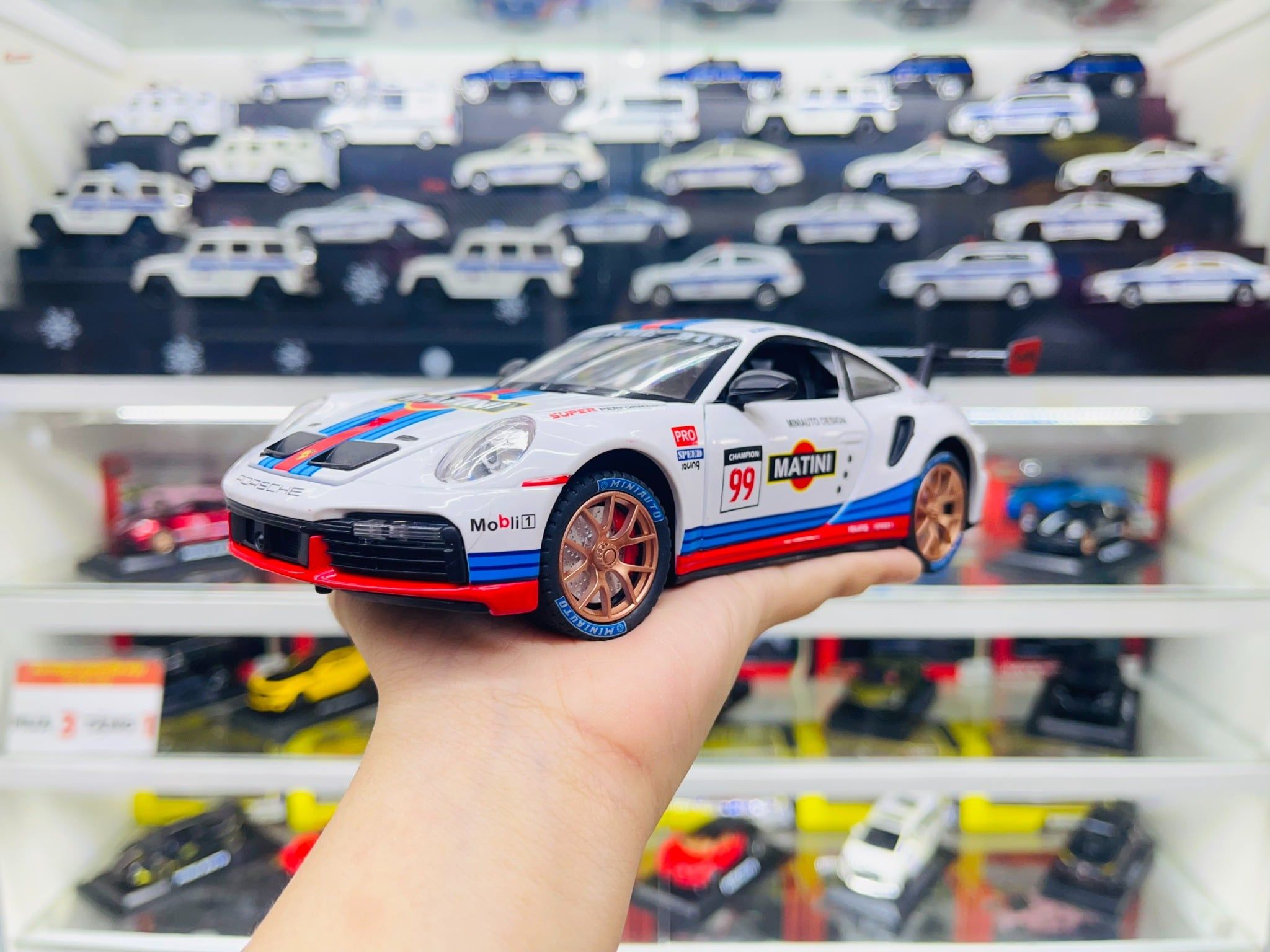  Mô hình xe Porsche 911 Gt3 Rsr đánh lái được full open 1:24 Miniauto OT404 
