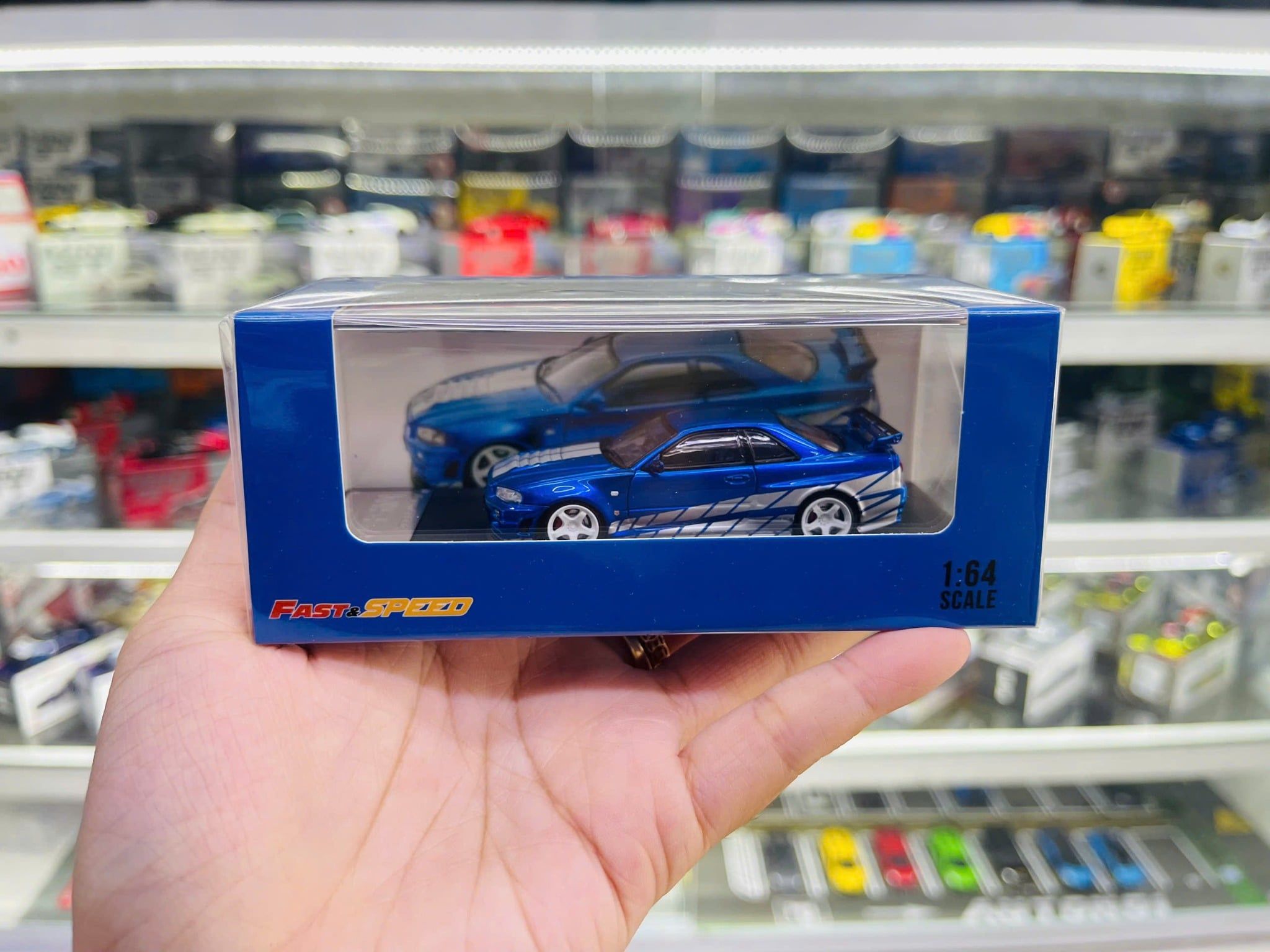  Mô hình xe Nissan Skyline GTR R34 Z tune nismo limited 499pcs tỉ lệ 1:64 Fast Speed OT64496 