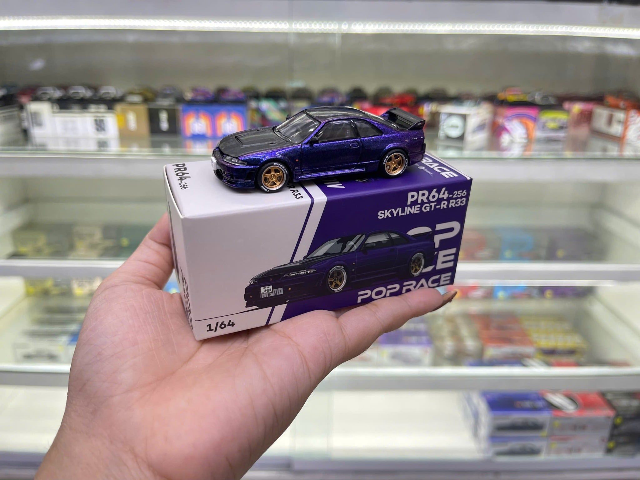  [Hàng Loose] Mô hình xe Nissan skyline GT-R R33 Nismo midnight purple tỉ lệ 1:64 Poprace PR640256 