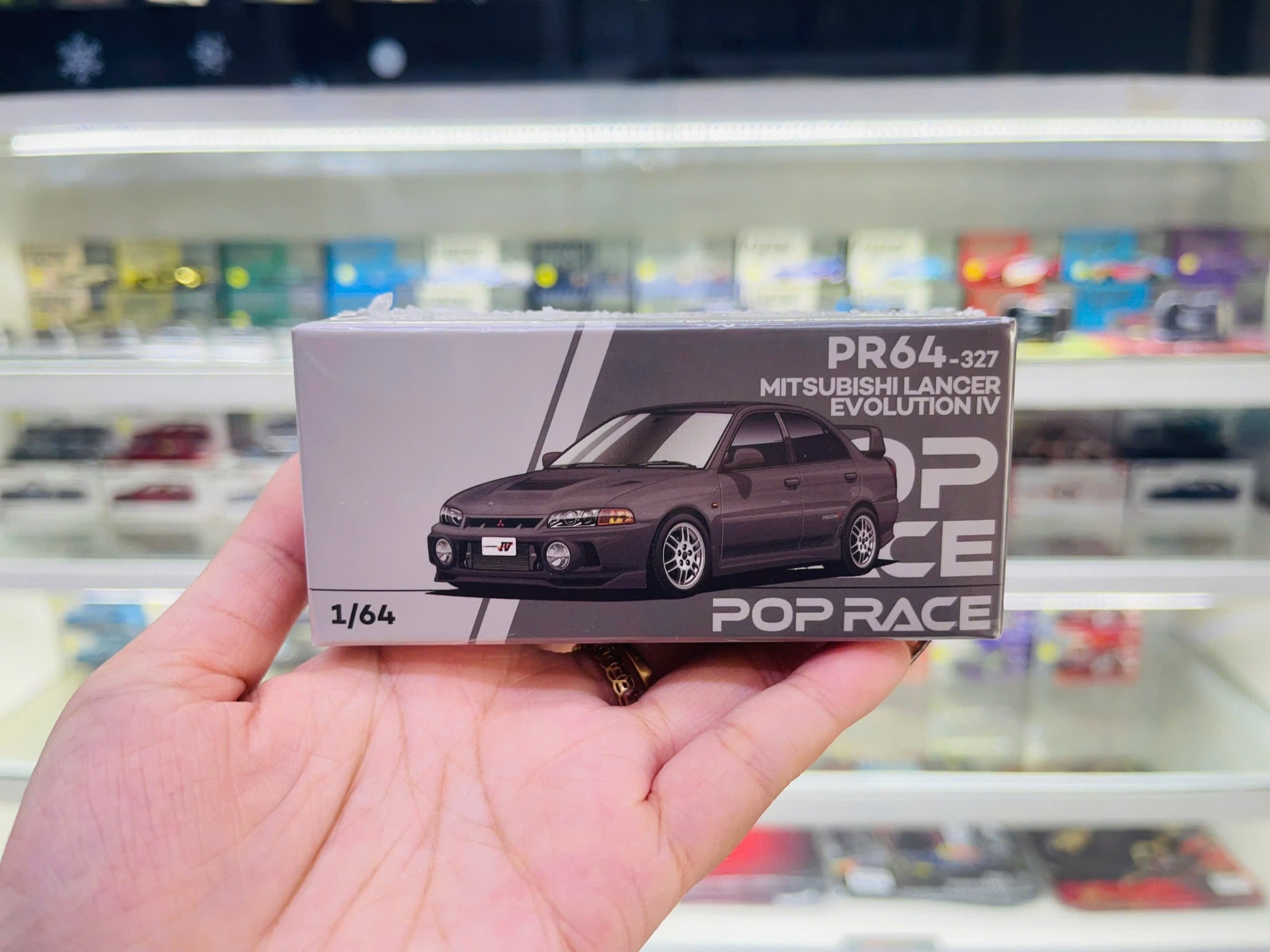  Mô hình xe Mitsubishi Lancer Evolution Iv Dark Grey tỉ lệ 1:64 PopRace PR640327 