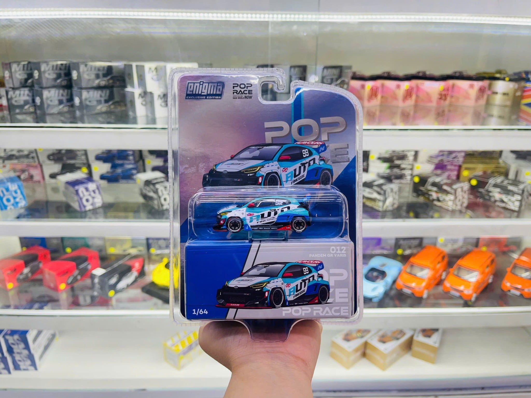  Mô hình xe PANDEM GR YARIS - AUTO FINESSE tỉ lệ 1:64 PopRace x Enigma PRE012 