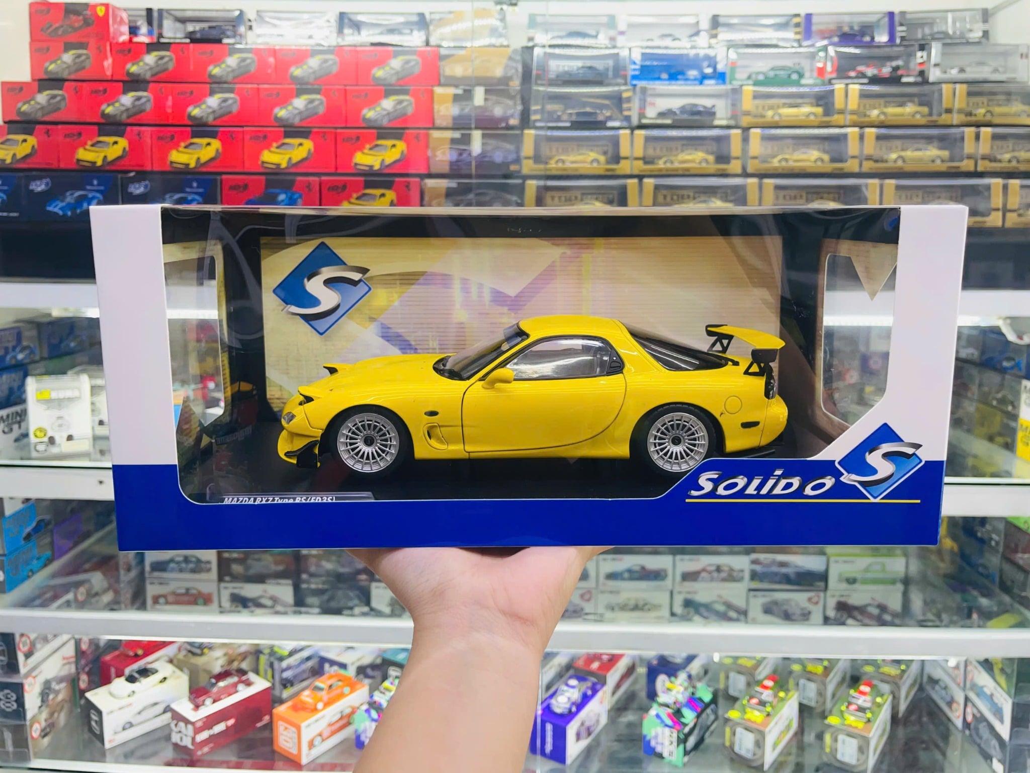  Mô hình xe ô tô Mazda RX7 FD RS yellow Streetfighter '94 tỉ lệ 1:18 Solido model S1810603 