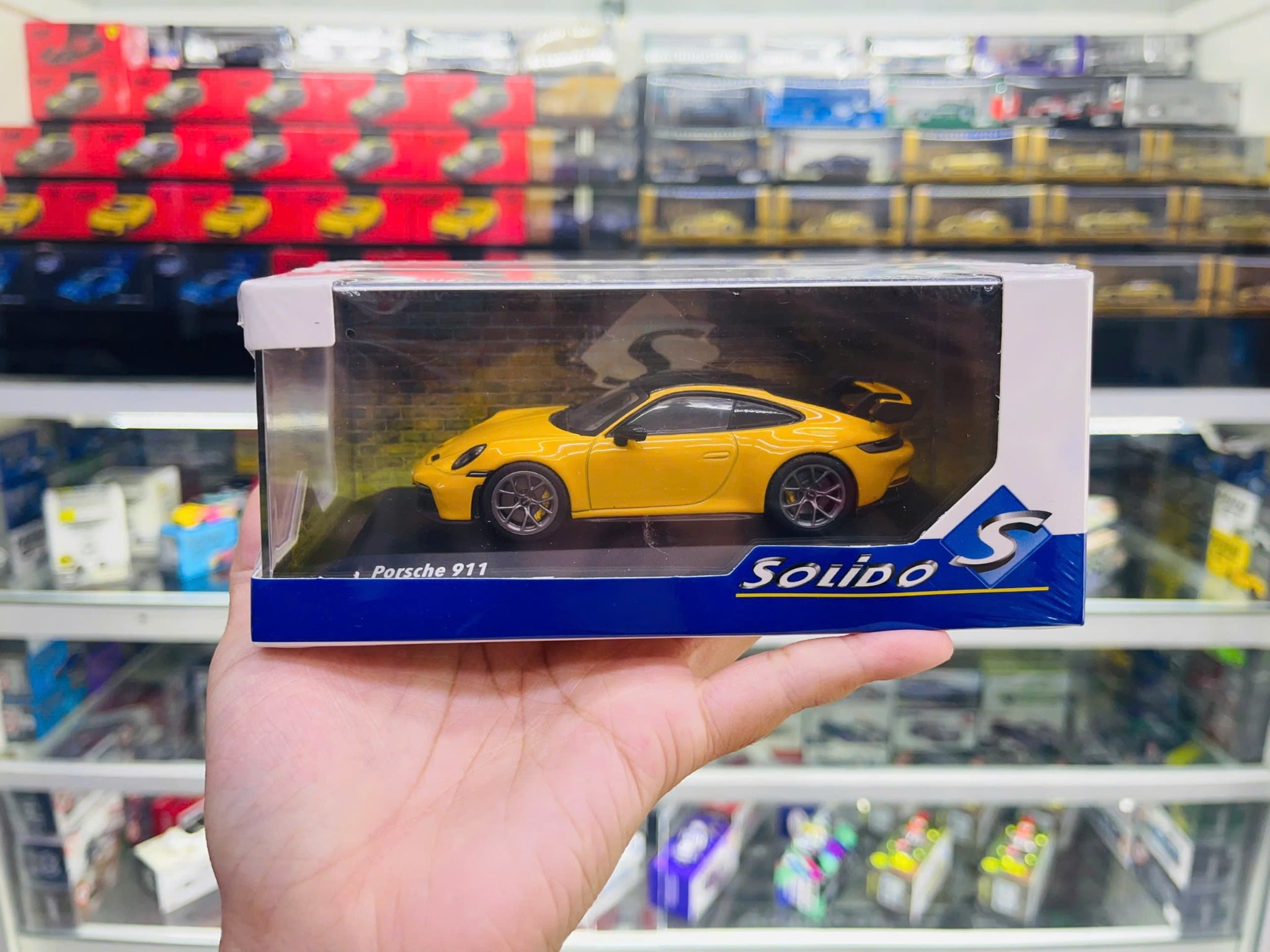  Mô hình xe ô tô Porsche 911 (992) GT3 RS – Signal Yellow – 2023 tỉ lệ 1:43 Solido model S4312504 