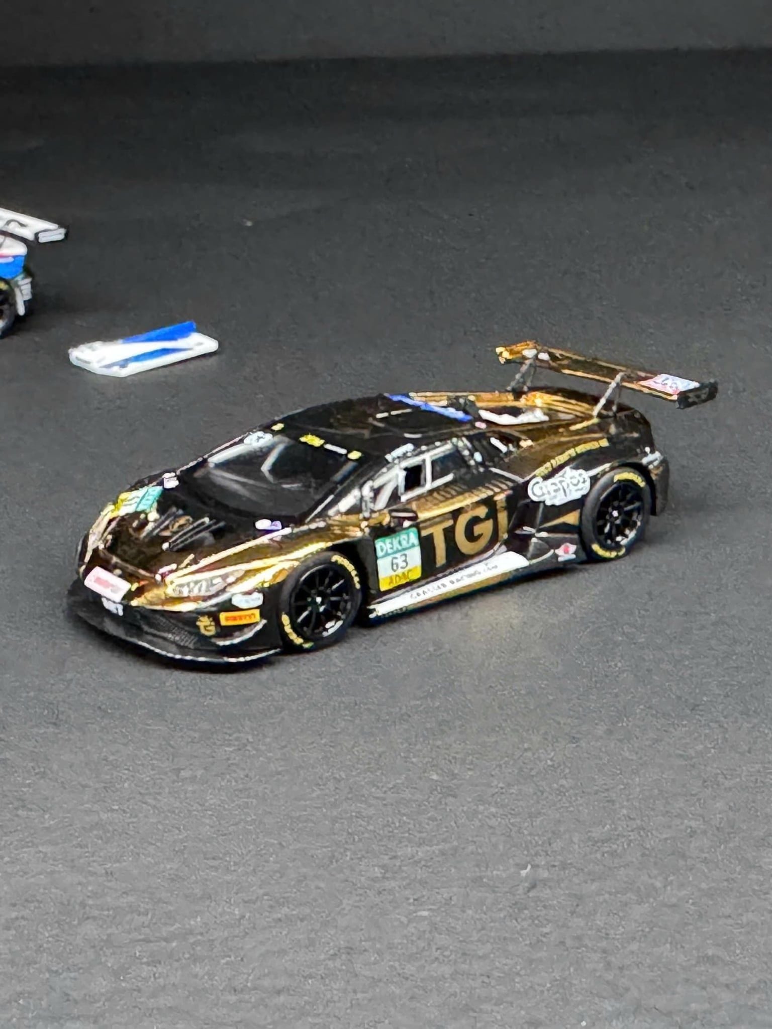 Mô hình xe Lamborghini Huracan GT3 EVO II - GRT-2025 DTM #63 tỉ lệ 1:64 Trends Hobby 241083F 
