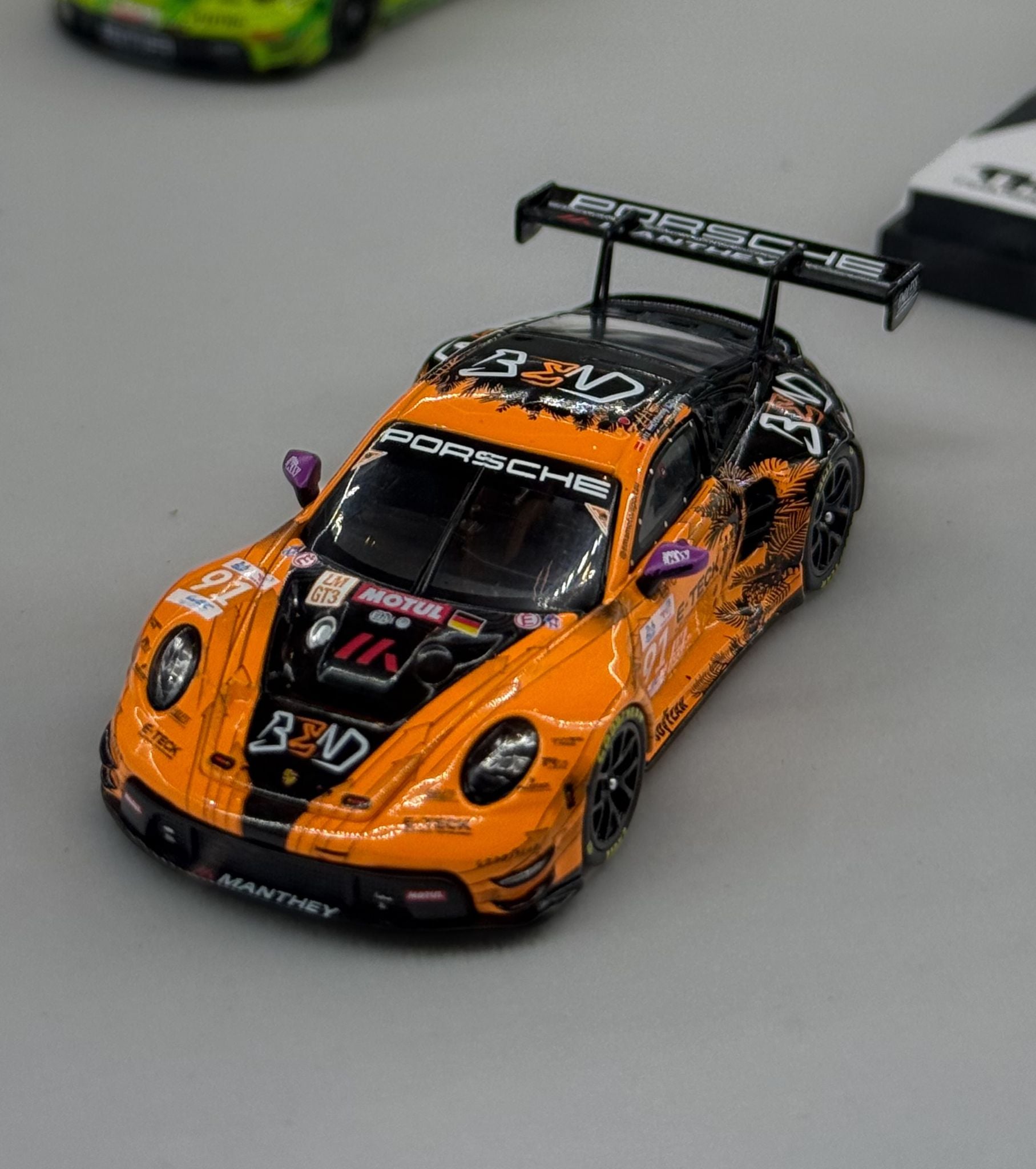  Mô hình xe Porsche 911 GT3 R - EMA Motorsport-2024 LeMans 24H LMGT3 Winner #91 tỉ lệ 1:64 Trends Hobby 241084K 