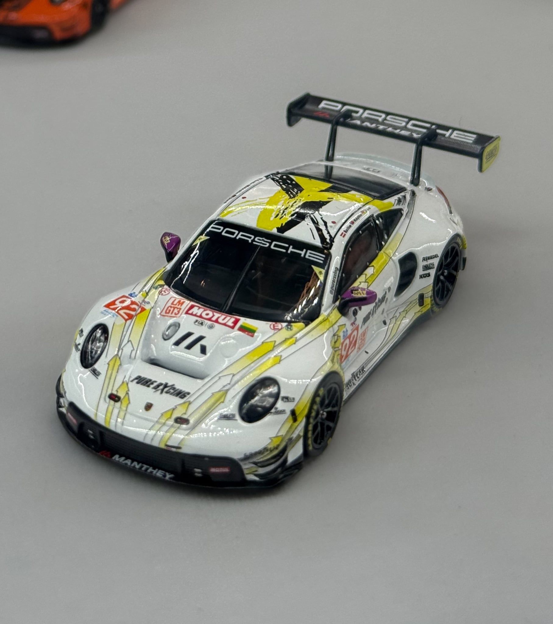 Mô hình xe Porsche 911 GT3 R - EMA Motorsport-2024 LeMans 24H LMGT3 Winner #92 tỉ lệ 1:64 Trends Hobby 241084L 