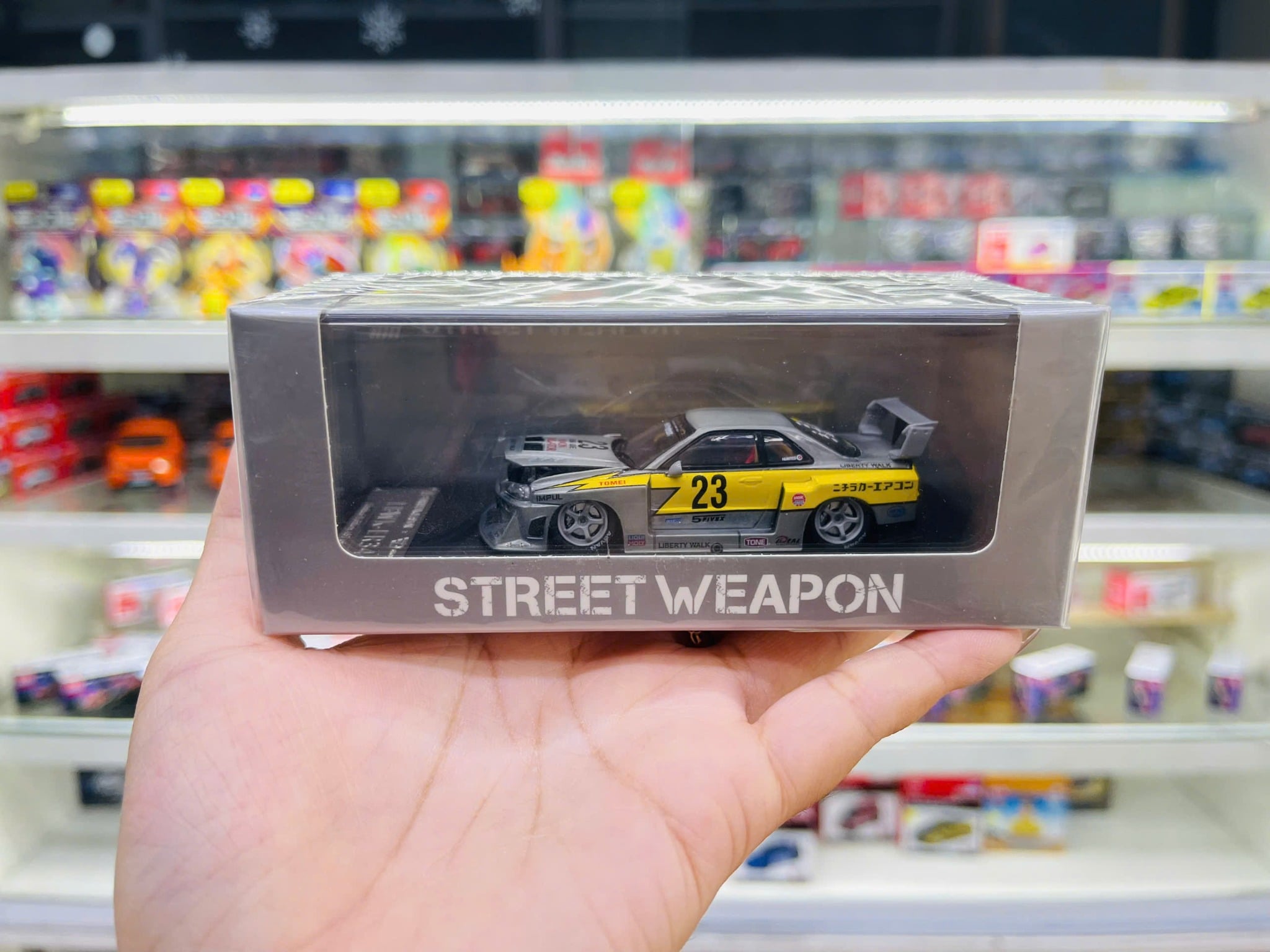  Mô hình xe Nissan ER34 LBWK silver model tỉ lệ 1:64 Street Weapon OT64486 