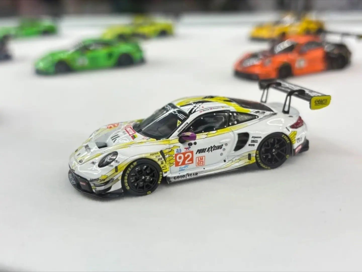  Mô hình xe Porsche 911 GT3 R - EMA Motorsport-2024 LeMans 24H LMGT3 Winner #92 tỉ lệ 1:64 Trends Hobby 241084L 