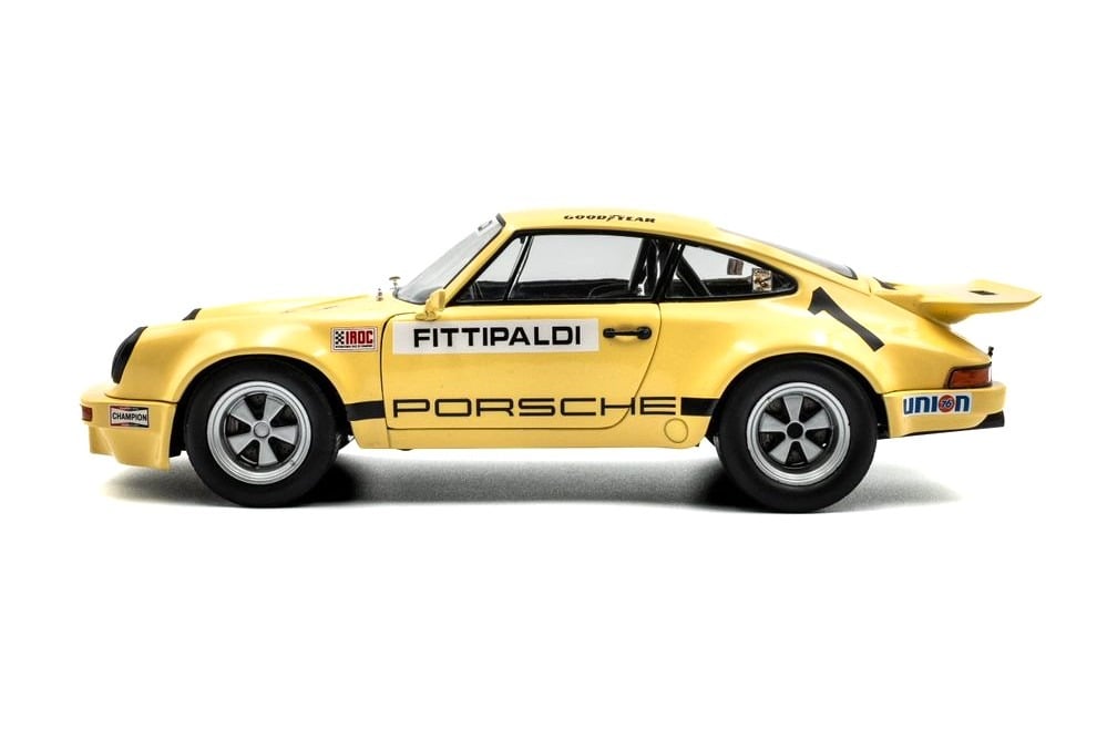  Mô hình xe ô tô Porsche 911 ROC - IROC Riverside 1974 #1 Fittipaldi tỉ lệ 1:18 Solido model S1810703 