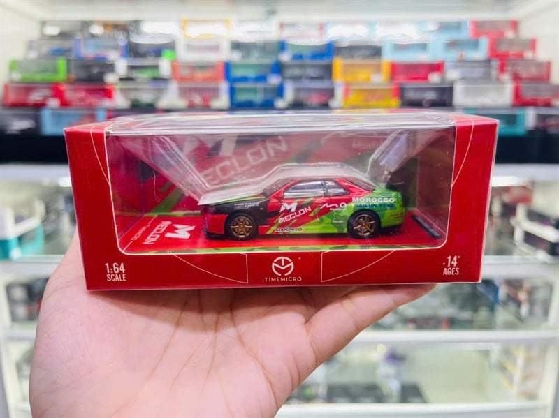  Mô hình xe Nissan GT-R R34 Macron Coating Simulation tỉ lệ 1:64 Time micro TM646310 