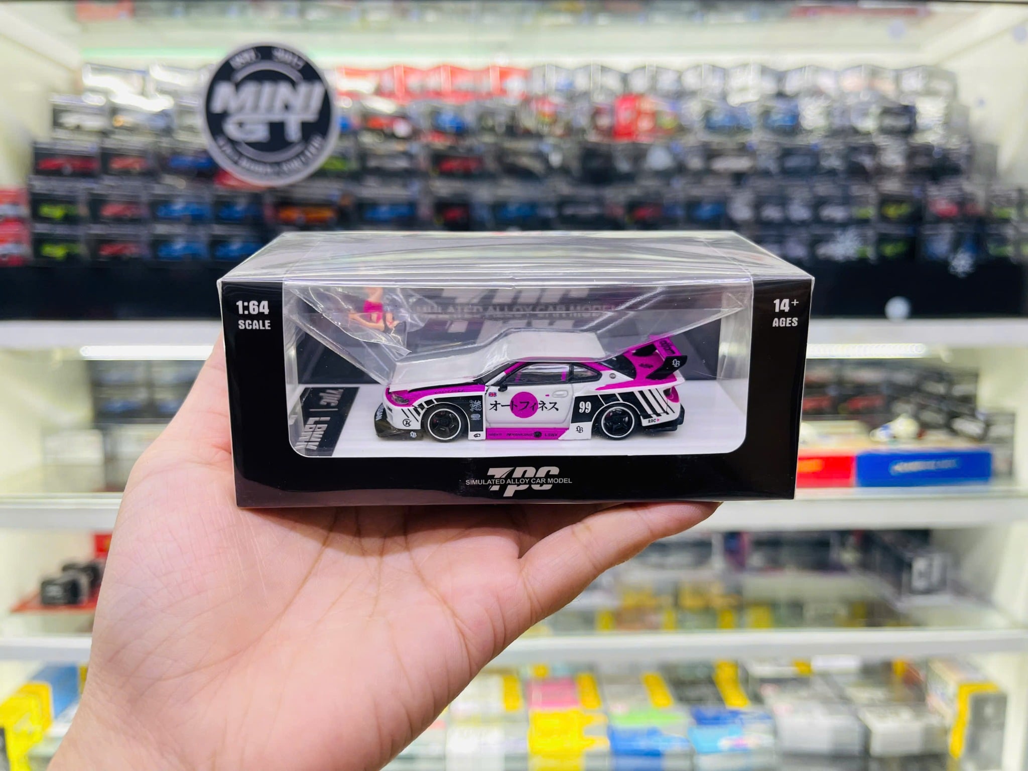  Mô hình xe Nissan S15 #781 Nissan LB-Super Silhouette S15 SILVIA Auto Finesse SEMA 2023 pink tỉ lệ 1:64 TPC model TPC646009 