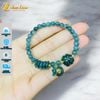 Vòng tay hạt lam ngọc 6 li mix ngũ điếu - cỏ 4 lá charm vàng treo túi tiền lam ngọc hợp mệnh chiêu tài hút lộc may mắn