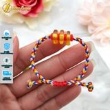  Vòng tay cho bé hạt hổ phách hoa bện chỉ cao cấp giúp bé bình an ăn ngon ngủ ngoan 