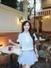 BAS33544 - Áo sơ mi kiểu vải thô kẻ dáng lửng cổ cao phối nơ tay ngắn thân áo phối viền tạo kiểu cài khuy trước - JAN.