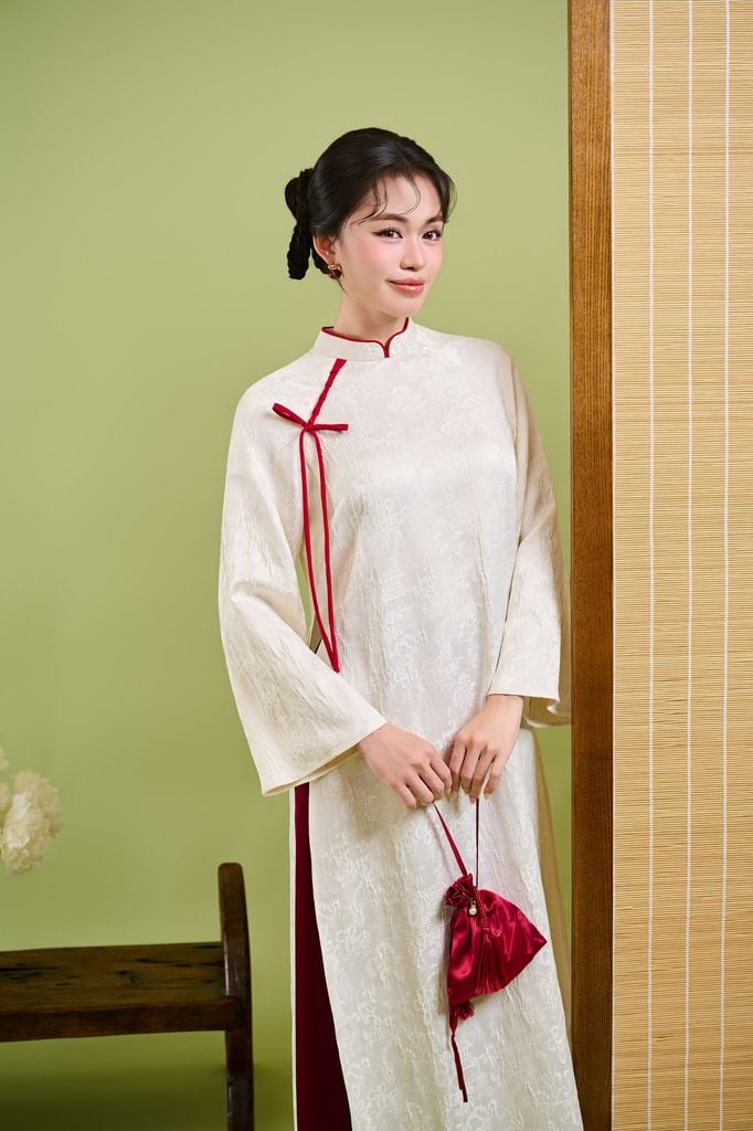 BDA50224 - Áo dài cách tân vải gấm dáng suông cổ tàu đính dây nơ tay dài khoá thân sau - JAN.