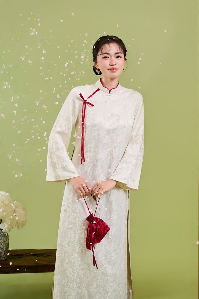 BDA50224 - Áo dài cách tân vải gấm dáng suông cổ tàu đính dây nơ tay dài khoá thân sau - JAN.