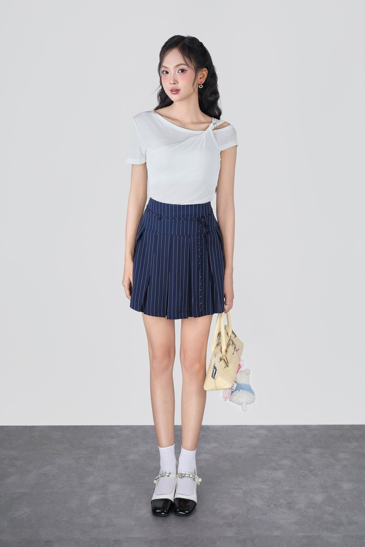 BJN33518 - Chân váy ngắn vải thô kẻ cạp cao thân váy xếp ly tạo kiểu - JAN.