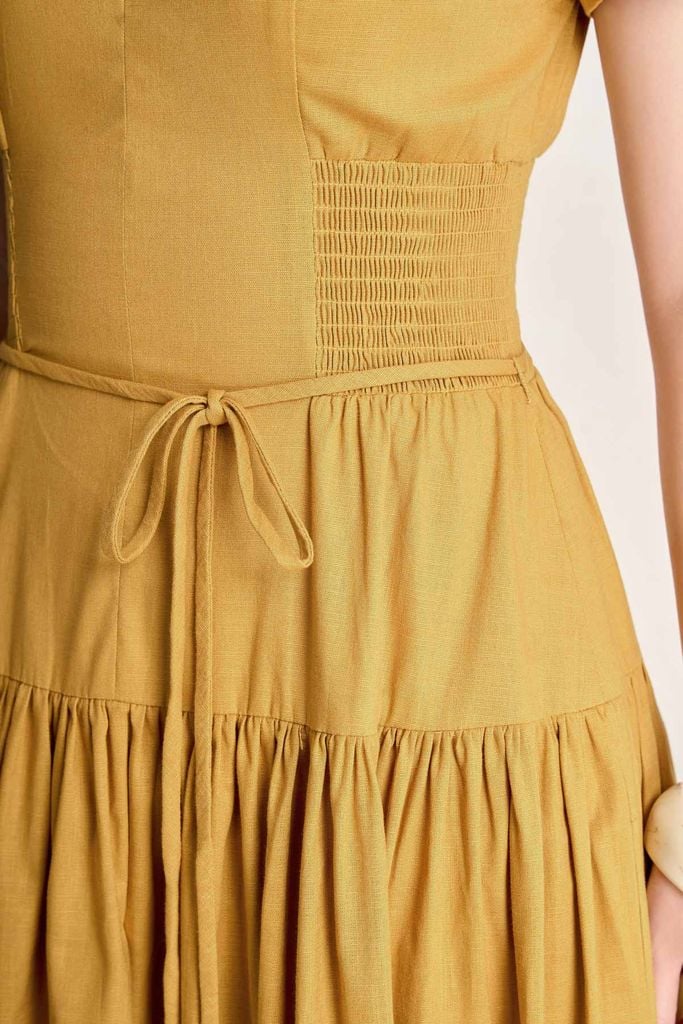 FDC35503 - Đầm công sở vải linen dáng chữ A cổ xẻ V tay cộc eo đáp cạp bản to thân váy xếp nhún tạo xoè - PANTIO
