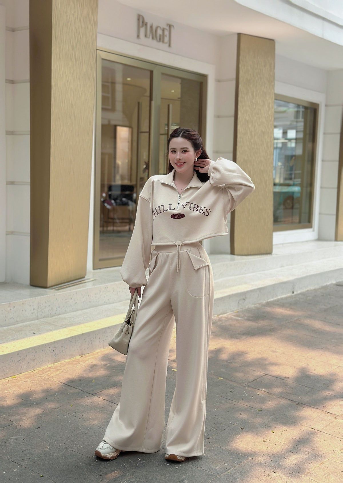 BAK93718 - Áo kiểu dạo phố vải thun cotton dáng croptop cổ bẻ phối khóa kim loại thân áo in hoạ tiết gấu bo chun ôm - JAN.
