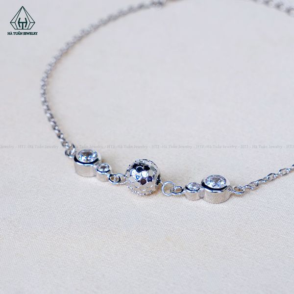 B112 Lắc tay bi phối đá