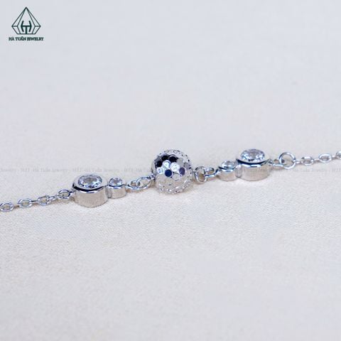 B112 Lắc tay bi phối đá
