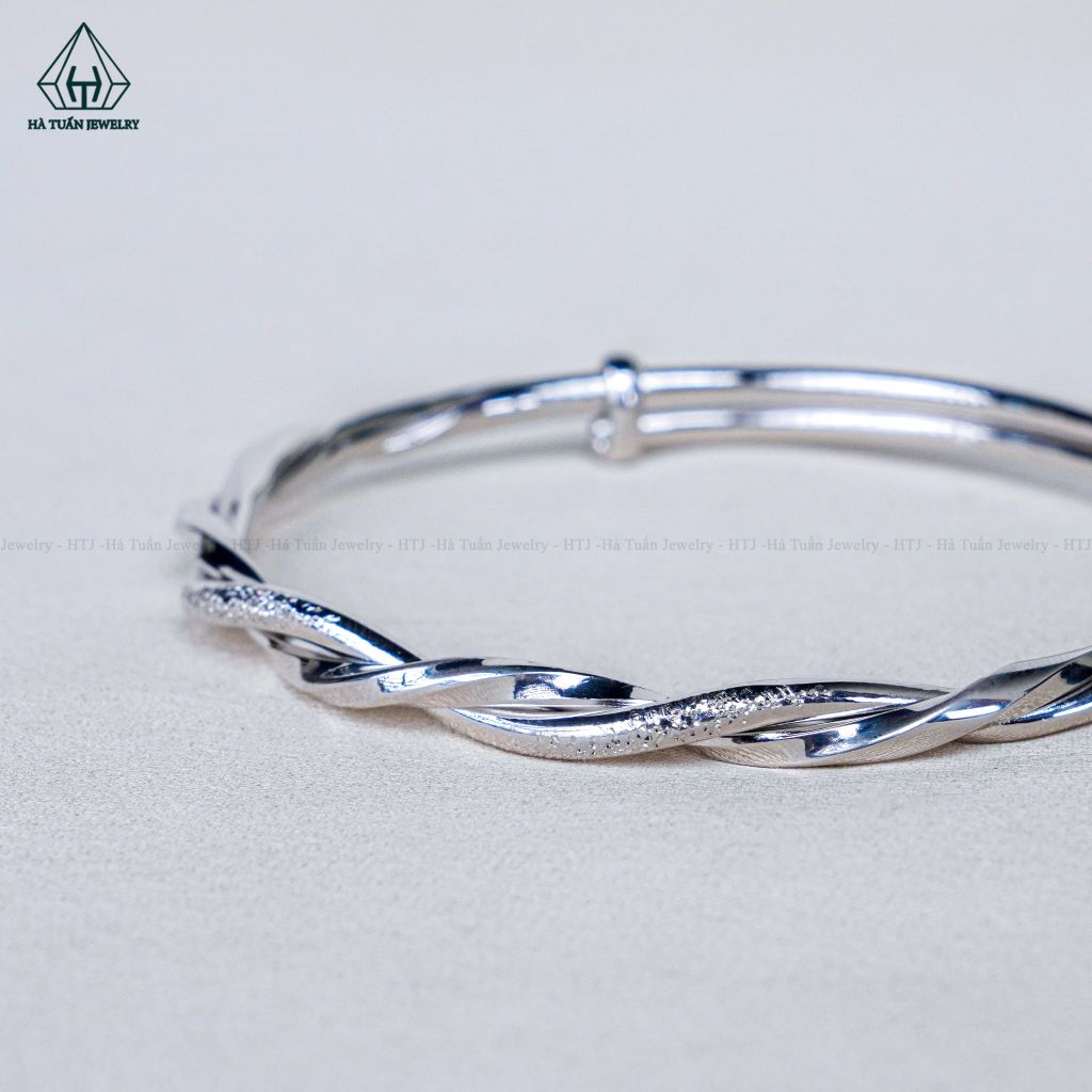 B086 Vòng tay xoắn charm hoa bướm
