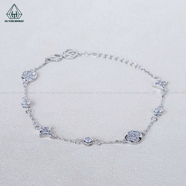  B082 Lắc tay L.V đá 