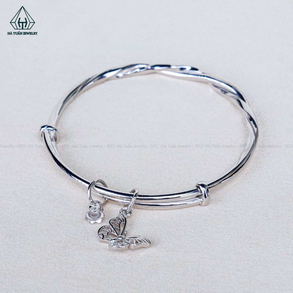 B086 Vòng tay xoắn charm hoa bướm