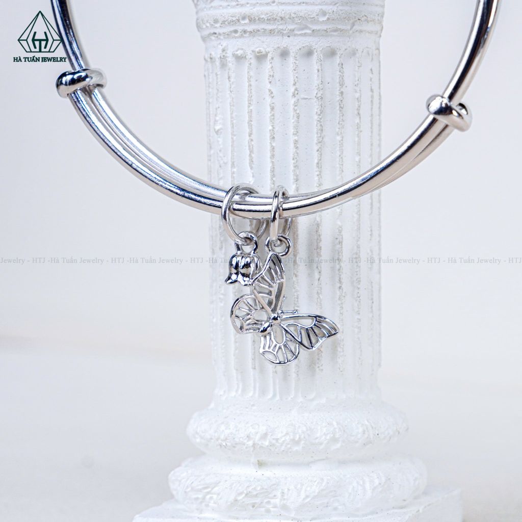 B086 Vòng tay xoắn charm hoa bướm