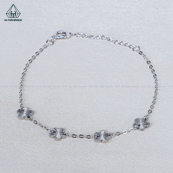  B093 Lắc tay V.A.N trắng 5 hoa móc máy 