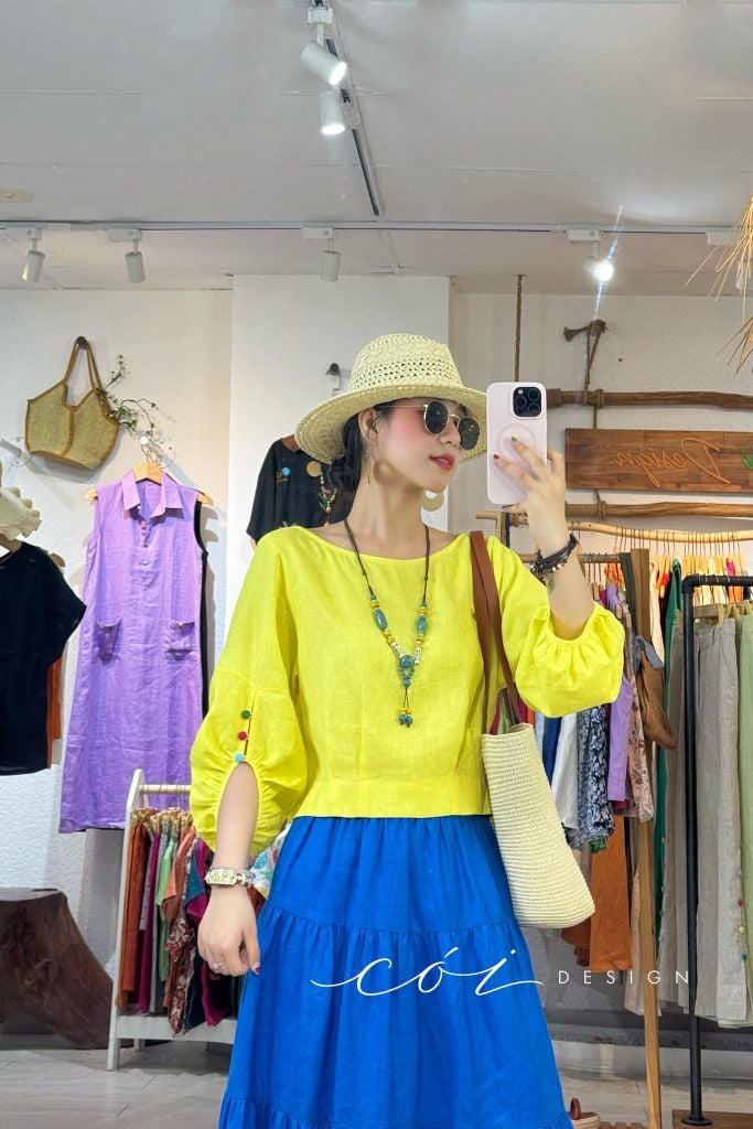 Áo tay phồng phối nơ lưng linen tưng premium Cói Design