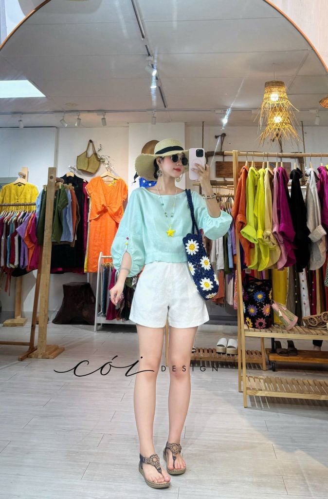 Áo tay phồng phối nơ lưng linen tưng premium Cói Design