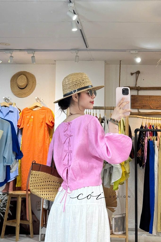 Áo tay phồng phối nơ lưng linen tưng premium Cói Design