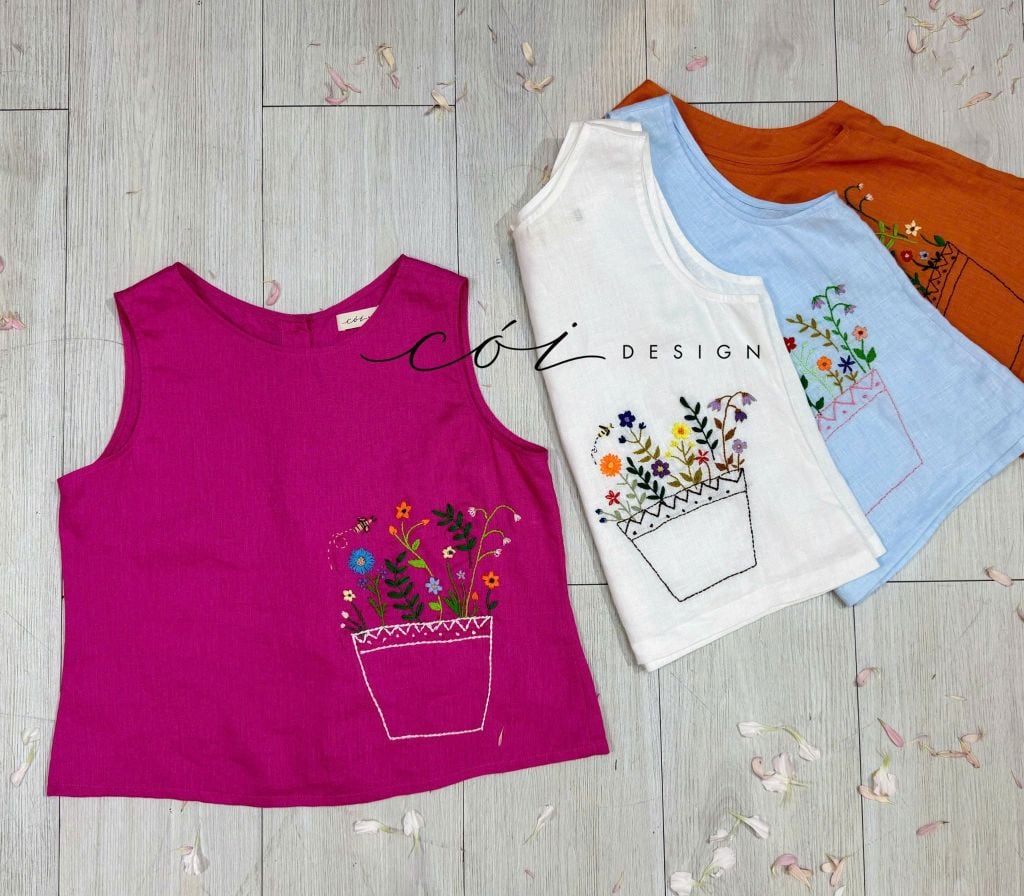 Áo nút bọc màu Vườn Hoa Trong Túi tưng premium Cói Design